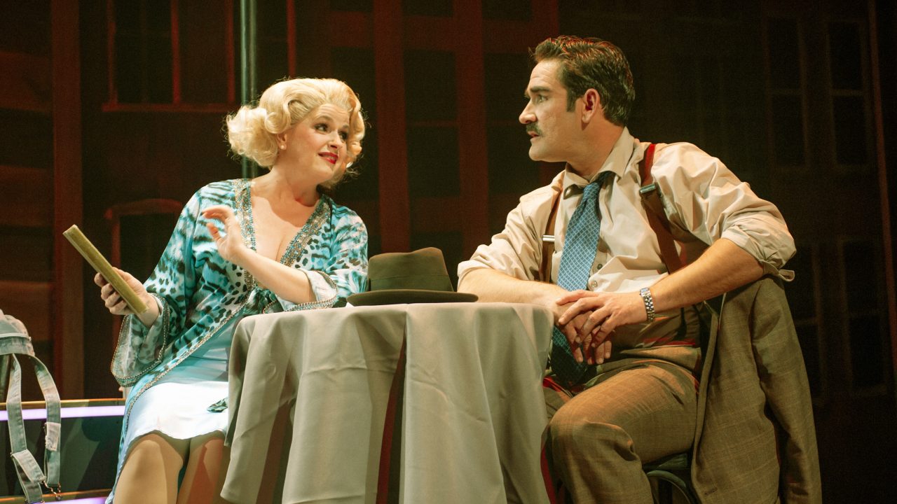 Adelaide (Melissa WolfKlain) and Nathan (Joel Roster) go on a date in San Francisco Playhouse's "Guys and Dolls," performing November 16, 2023 - January 13, 2024.