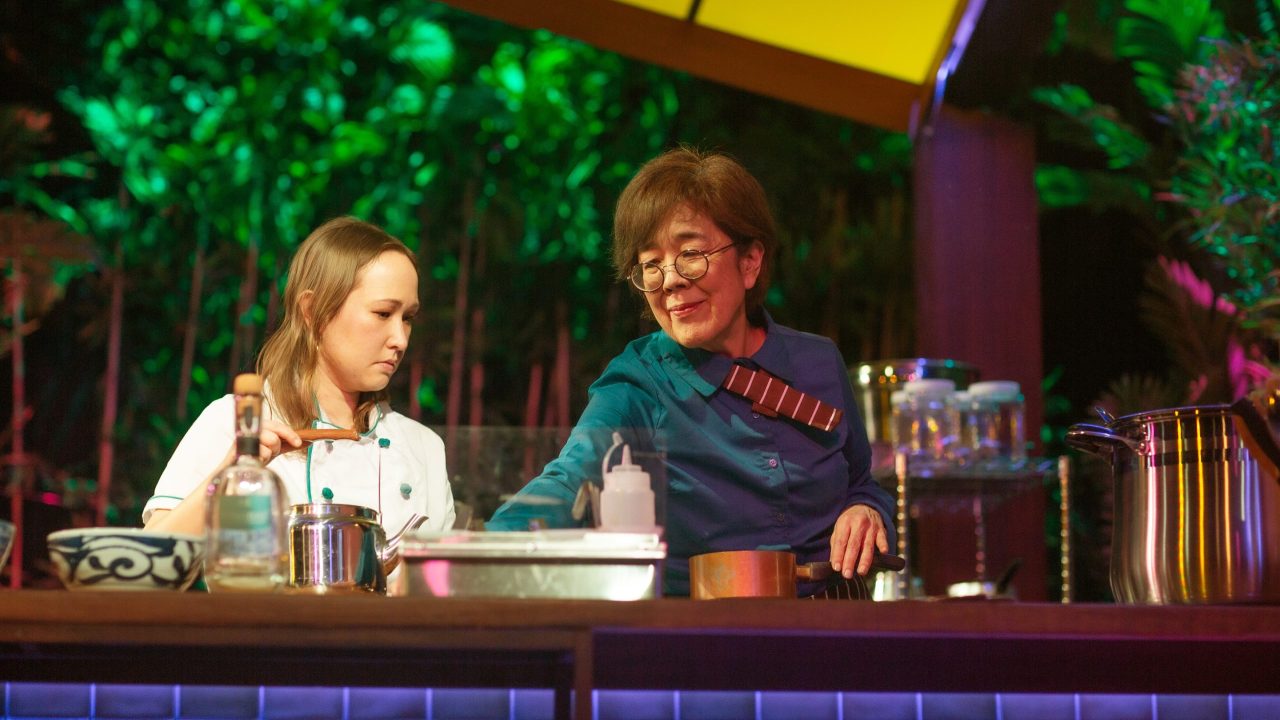 Mai (Jenny Nguyen Nelson) and Lan (Sharon Omi) work in the kitchen in San Francisco Playhouse's World Premiere Play "My Home on the Moon," performing January 25 - February 24.