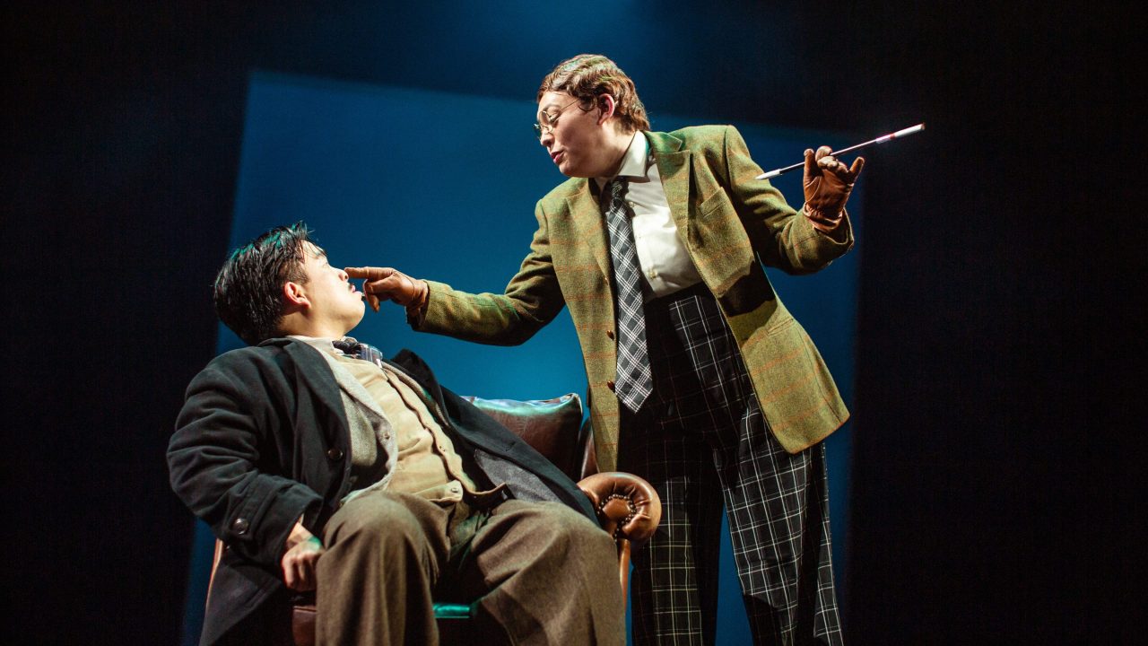 Richard Hannay (Phil Wong) is taunted by The Professor (Renee Rogoff) in "The 39 Steps," presented by San Francisco Playhouse March 7 - April 20. Richard Hannay (Phil Wong) is taunted by The Professor (Renee Rogoff) in "The 39 Steps," presented by San Francisco Playhouse March 7 - April 20.