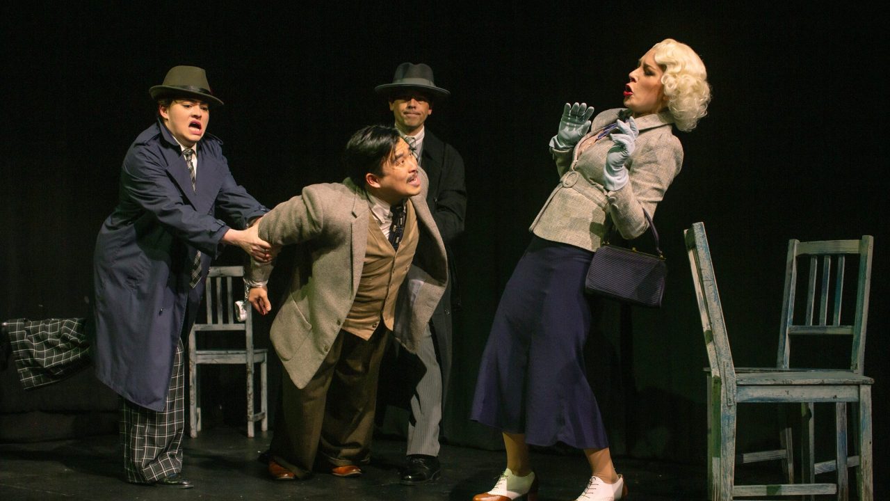 Richard Hannay (center - Phil Wong) is apprehended by two policemen (l to r: Renee Rogoff and Greg Ayers) as Pamela (Maggie Mason) denies association in "The 39 Steps," presented by San Francisco Playhouse March 7 - April 20. Richard Hannay (center - Phil Wong) is apprehended by two policemen (l to r: Renee Rogoff and Greg Ayers) as Pamela (Maggie Mason) denies association in "The 39 Steps," presented by San Francisco Playhouse March 7 - April 20.
