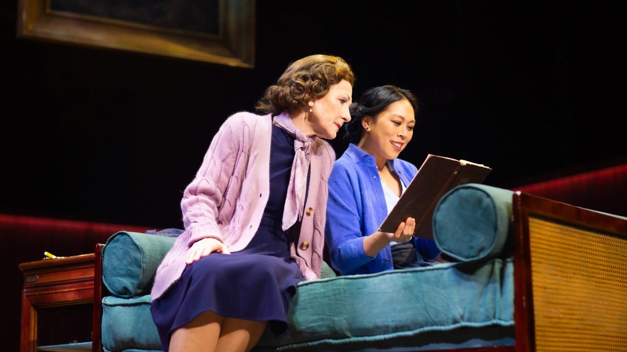 Amanda (Susi Damilano) and Laura (Nicole Javier) review a yearbook in San Francisco Playhouse's "The Glass Menagerie," performing May 2 - June 15. Amanda (Susi Damilano) and Laura (Nicole Javier) review a yearbook in San Francisco Playhouse's "The Glass Menagerie," performing May 2 - June 15.