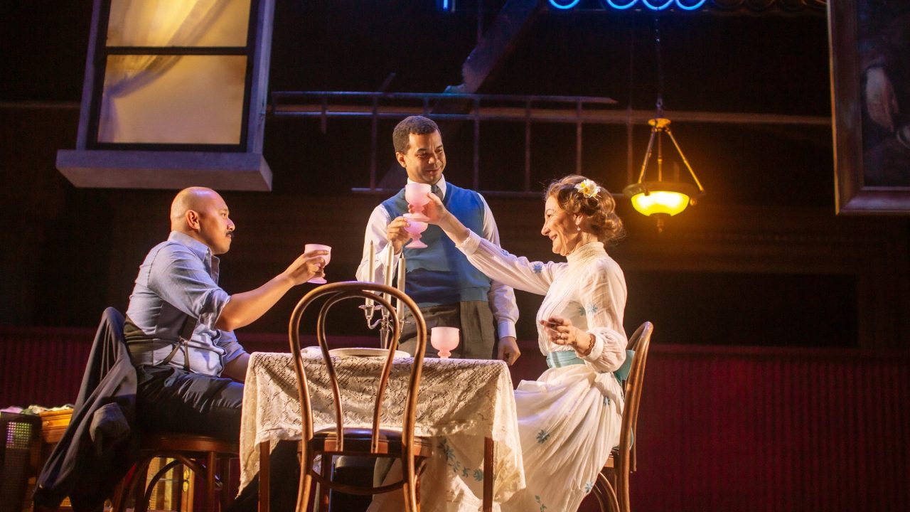 Tom (Jomar Tagatac), Jim (William Thomas Hodgson) and Amanda (Susi Damilano) toast to their meal in San Francisco Playhouse's "The Glass Menagerie," performing May 2 - June 15. Tom (Jomar Tagatac), Jim (William Thomas Hodgson) and Amanda (Susi Damilano) toast to their meal in San Francisco Playhouse's "The Glass Menagerie," performing May 2 - June 15.