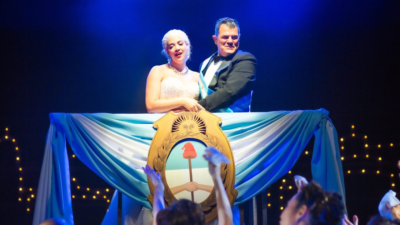 Eva Perón (Sophia Alawi) and Juan Perón (Peter Gregus) address the crowd in San Francisco Playhouse's "Evita," performing June 27 - September 7, 2024. Eva Perón (Sophia Alawi) and Juan Perón (Peter Gregus) address the crowd in San Francisco Playhouse's "Evita," performing June 27 - September 7, 2024.