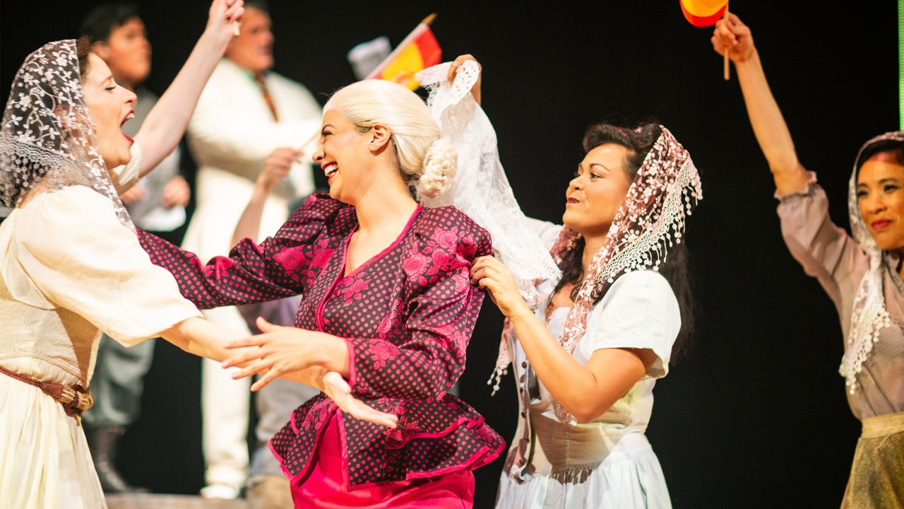 Eva Perón (center - Sophia Alawi) is embraced by her public (l to r: Gabriella Goldstein, Malia Abayon, Dian Sitip Meechai) in San Francisco Playhouse's "Evita," performing June 27 - September 7, 2024. Eva Perón (center - Sophia Alawi) is embraced by her public (l to r: Gabriella Goldstein, Malia Abayon, Dian Sitip Meechai) in San Francisco Playhouse's "Evita," performing June 27 - September 7, 2024.