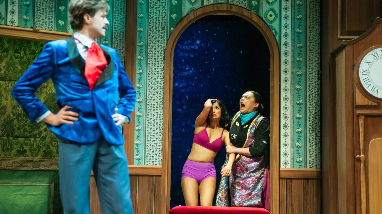 Jonathan (Adam Griffith) watches as Sandra (Erin Rose Solorio) and Annie (Renee Rogoff) fight in "The Play That Goes Wrong," presented by San Francisco Playhouse September 21 - November 9. "The Play That Goes Wrong" production photo.