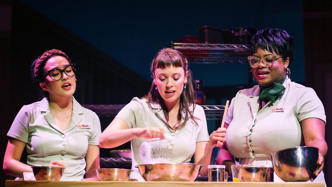 Dawn (Sharon Shao), Jenna (Ruby Day), and Becky (Tanika Baptiste) are waitresses in a smalltown diner in "Waitress," presented by San Francisco Playhouse November 21 – January 18. "Waitress" production photo.