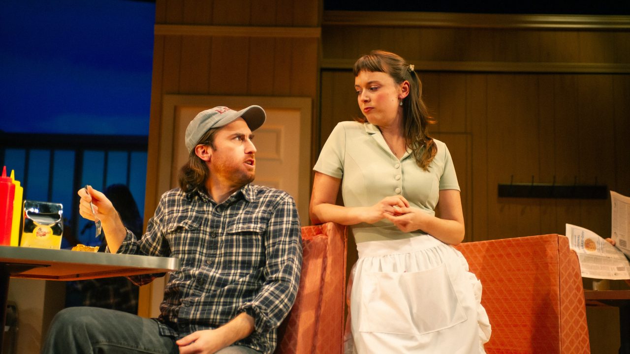 Earl (Ben Euphrat) visits his wife Jenna (Ruby Day) at the diner in "Waitress," presented by San Francisco Playhouse November 21 – January 18. "Waitress" production photo.