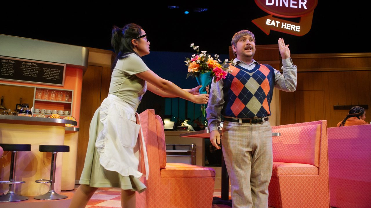 Dawn (Sharon Shao) is ambushed by overeager Ogie (Michael Parrott) in "Waitress," presented by San Francisco Playhouse November 21 – January 18. "Waitress" production photo.