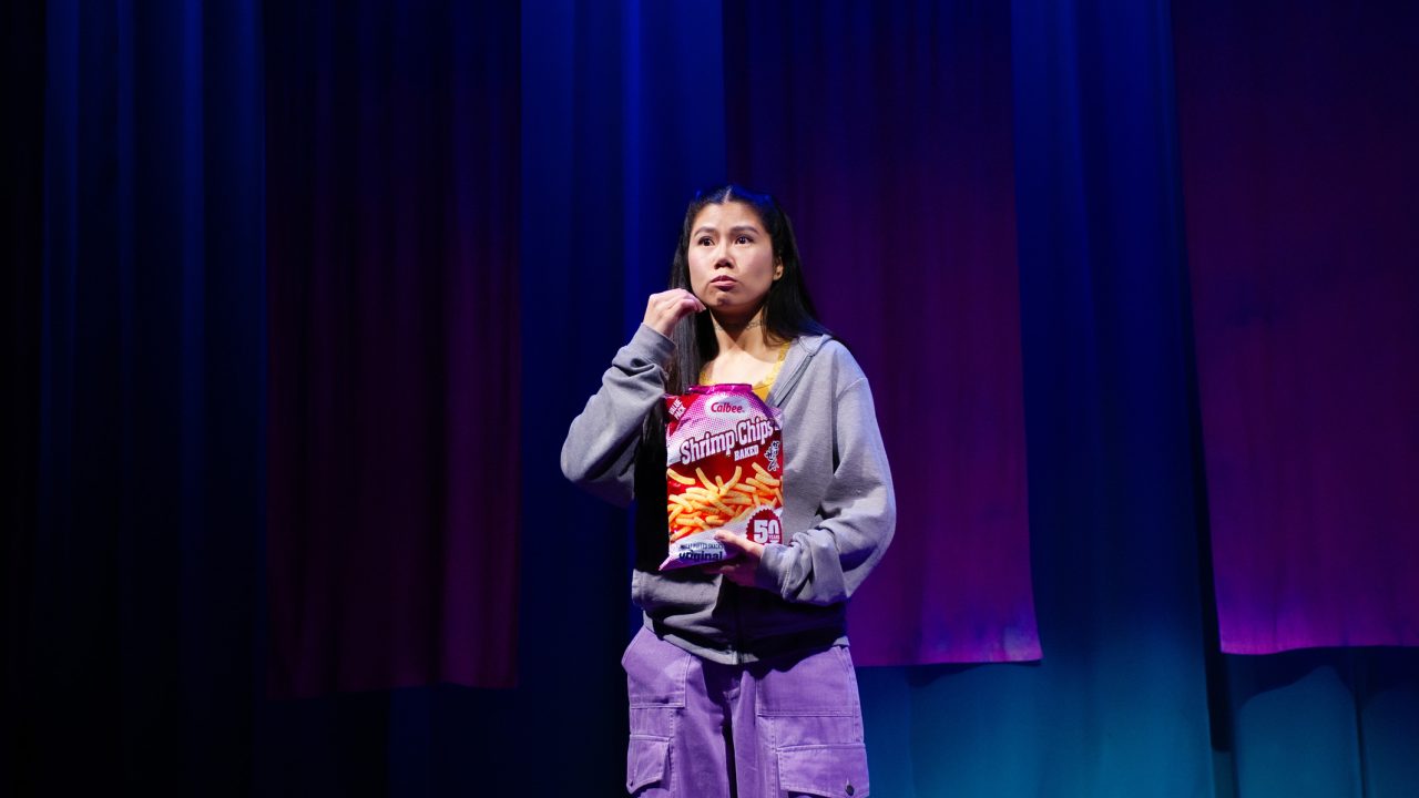 Ami (Ana Ming Bostwick-Singer) enjoys a snack with MSG in San Francisco Playhouse's "Exotic Deadly: Or the MSG Play," performing January 30 - March 8. Ami (Ana Ming Bostwick-Singer) enjoys a snack with MSG in San Francisco Playhouse's "Exotic Deadly: Or the MSG Play," performing January 30 - March 8.