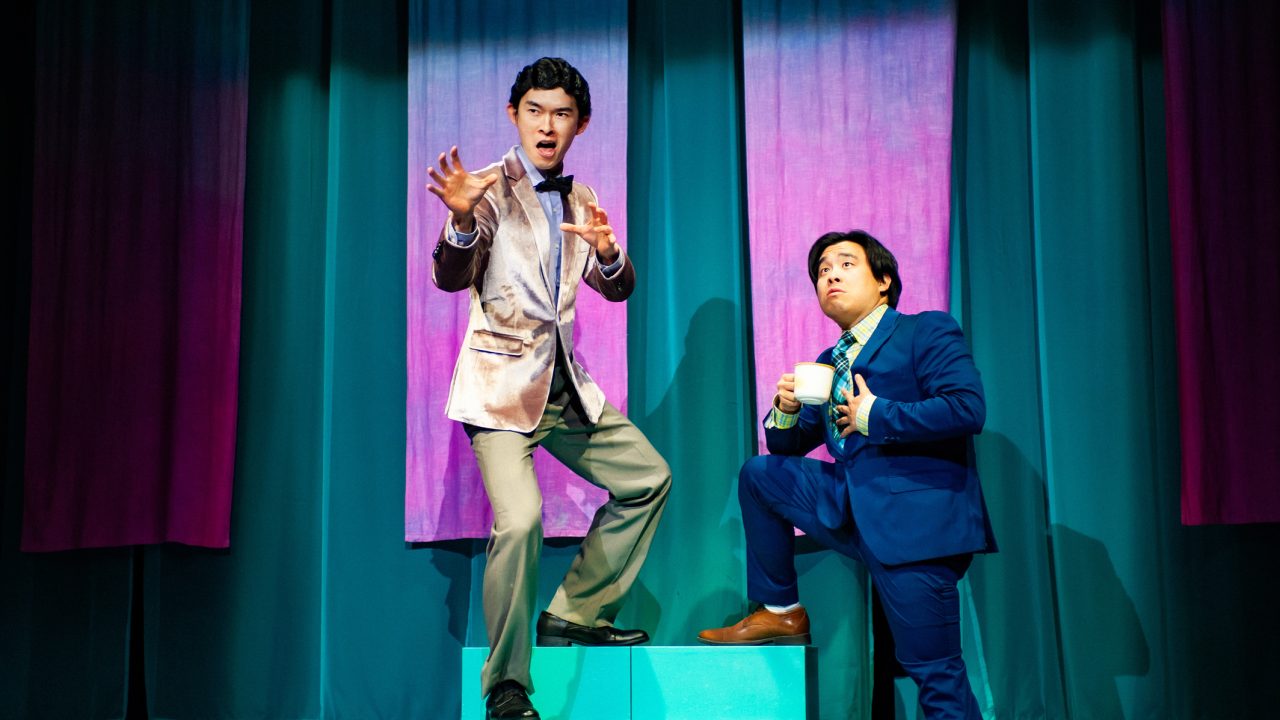 Dr. Lyle (Edric Young) and "Good Morning Suburbia" host (Phil Wong) warn viewers of MSG's dangers in San Francisco Playhouse's "Exotic Deadly: Or the MSG Play," performing January 30 - March 8. Dr. Lyle (Edric Young) and "Good Morning Suburbia" host (Phil Wong) warn viewers of MSG's dangers in San Francisco Playhouse's "Exotic Deadly: Or the MSG Play," performing January 30 - March 8.