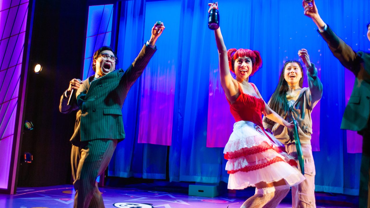 Mr. Ajinomoto (Phil Wong) toasts the company's new creation MSG (Francesca Fernandez) with Ami (Ana Ming Bostwick-Singer) in San Francisco Playhouse's "Exotic Deadly: Or the MSG Play," performing January 30 - March 8. Mr. Ajinomoto (Phil Wong) toasts the company's new creation MSG (Francesca Fernandez) with Ami (Ana Ming Bostwick-Singer) in San Francisco Playhouse's "Exotic Deadly: Or the MSG Play," performing January 30 - March 8.