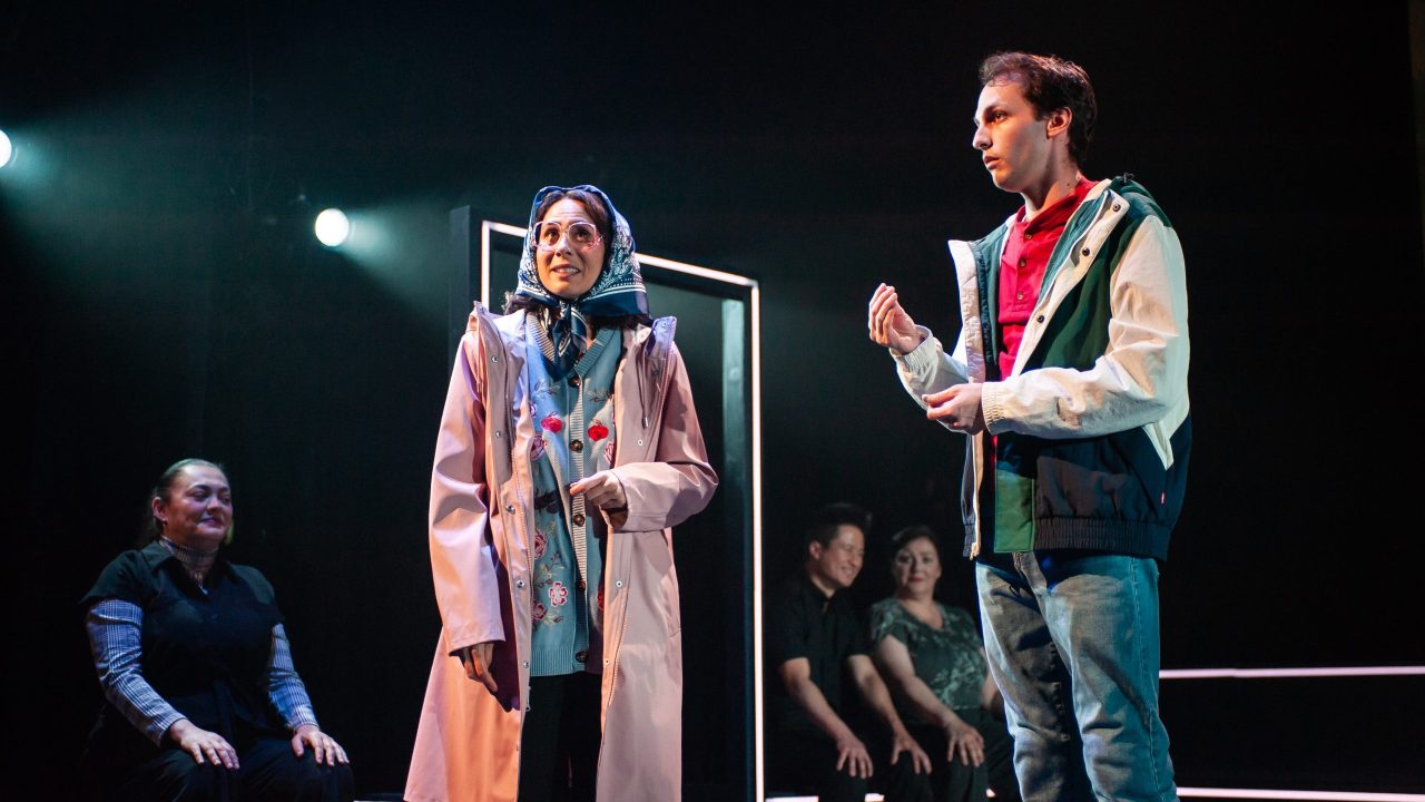 Mrs. Alexander (Laura Domingo) talks with neighbor Christopher (Brendan Looney) in San Francisco Playhouse's "The Curious Incident of the Dog in the Night-Time," performing May 1 - June 21. Mrs. Alexander (Laura Domingo) talks with neighbor Christopher (Brendan Looney) in San Francisco Playhouse's "The Curious Incident of the Dog in the Night-Time," performing May 1 - June 21.