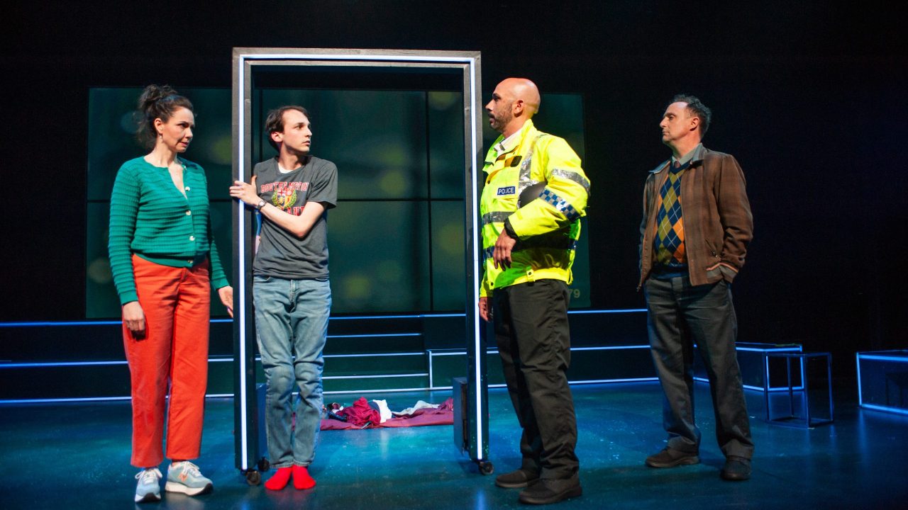 Judy (Liz Sklar) and Christopher (Brendan Looney) discuss the situation with a police officer (Wiley Naman Strasser) as Roger (Cassidy Brown) listens in San Francisco Playhouse's "The Curious Incident of the Dog in the Night-Time," performing May 1 - June 21. Judy (Liz Sklar) and Christopher (Brendan Looney) discuss the situation with a police officer (Wiley Naman Strasser) as Roger (Cassidy Brown) listens in San Francisco Playhouse's "The Curious Incident of the Dog in the Night-Time," performing May 1 - June 21.