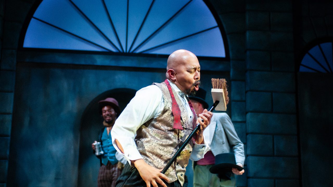 Jomar Tagatac as Alfred P. Doolittle in San Francisco Playhouse's "My Fair Lady," performing July 3 - September 13, 2025. Jomar Tagatac as Alfred P. Doolittle in San Francisco Playhouse's "My Fair Lady," performing July 3 - September 13, 2025.