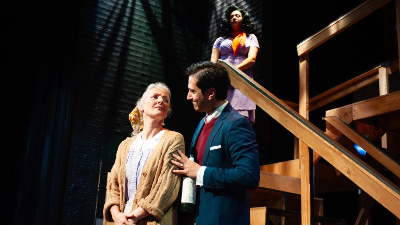 Dotty (Julie Eccles) and Frederick (Nima Rakhshanifar) share a moment as Brooke (Sophia Alawi) watches in San Francisco Playhouse's "Noises Off," performing September 25 - November 8. Dotty (Julie Eccles) and Frederick (Nima Rakhshanifar) share a moment as Brooke (Sophia Alawi) watches in San Francisco Playhouse's "Noises Off," performing September 25 - November 8.