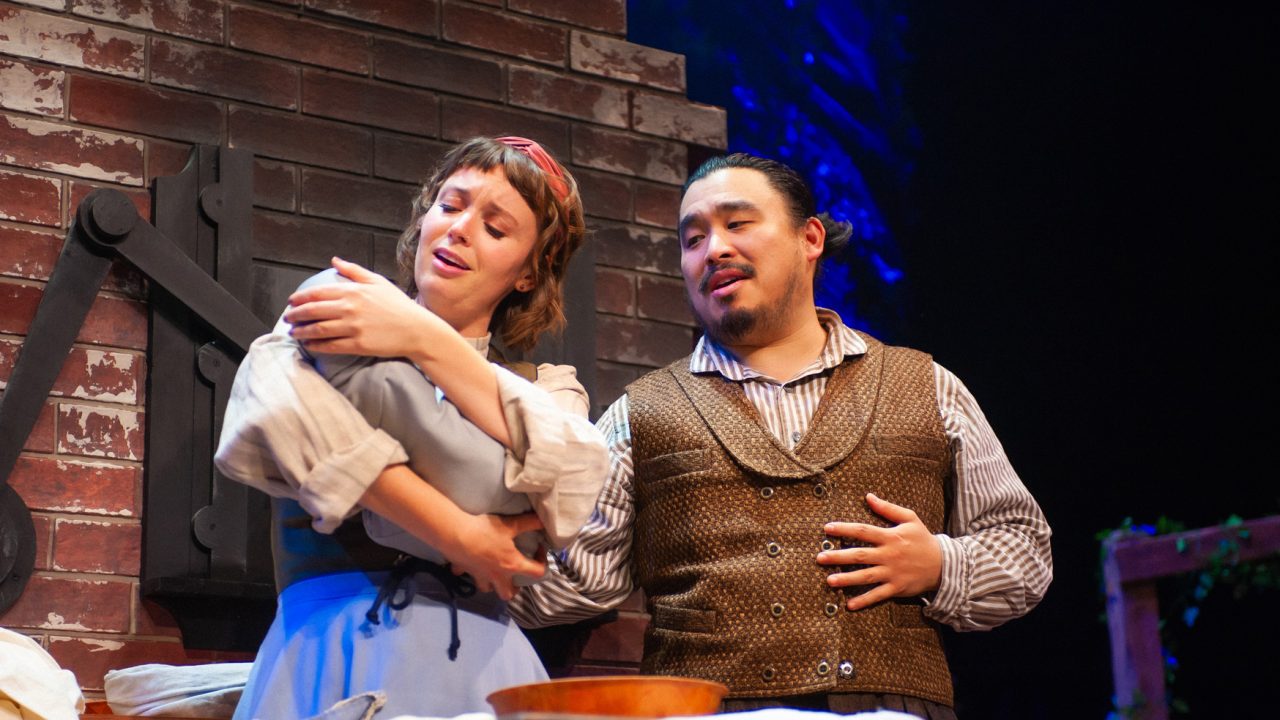 The Baker's Wife (Ruby Day) and The Baker (Phil Wong) dote on their baby in San Francisco Playhouse's "Into the Woods," performing November 20, 2025 - January 17, 2026. The Baker's Wife (Ruby Day) and The Baker (Phil Wong) dote on their baby in San Francisco Playhouse's "Into the Woods," performing November 20, 2025 - January 17, 2026.