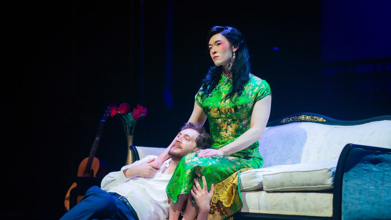 Rene Gallimard (Dean Linnard) and Song Liling (Edric Young) are lovers in San Francisco Playhouse's "M. Butterfly," performing February 5 - March 14, 2026. Rene Gallimard (Dean Linnard) and Song Liling (Edric Young) are lovers in San Francisco Playhouse's "M. Butterfly," performing February 5 - March 14, 2026.