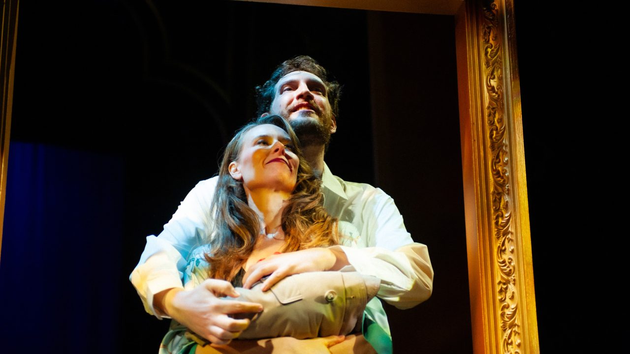 Helga (Elena Wright) and Rene Gallimard (Dean Linnard) embrace in San Francisco Playhouse's "M. Butterfly," performing February 5 - March 14, 2026.