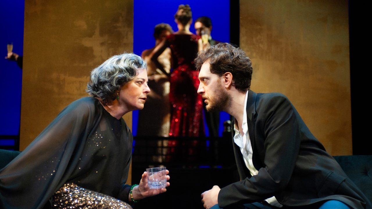 M. Toulon (Stacy Ross) and Rene Gallimard (Dean Linnard) discuss foreign relations in San Francisco Playhouse's "M. Butterfly," performing February 5 - March 14, 2026. M. Toulon (Stacy Ross) and Rene Gallimard (Dean Linnard) discuss foreign relations in San Francisco Playhouse's "M. Butterfly," performing February 5 - March 14, 2026.