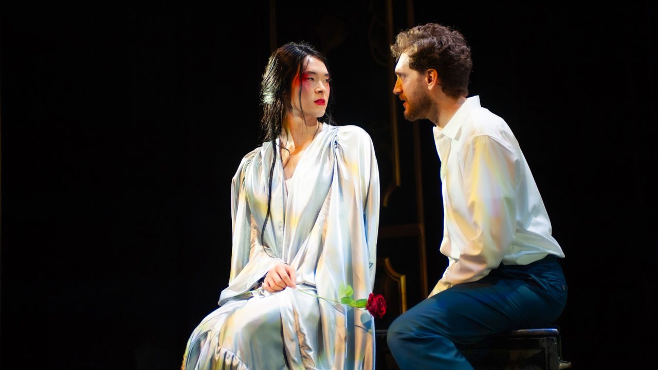 Song Liling (Edric Young) and Rene Gallimard (Dean Linnard) share a moment in San Francisco Playhouse's "M. Butterfly," performing February 5 - March 14, 2026. Song Liling (Edric Young) and Rene Gallimard (Dean Linnard) share a moment in San Francisco Playhouse's "M. Butterfly," performing February 5 - March 14, 2026.