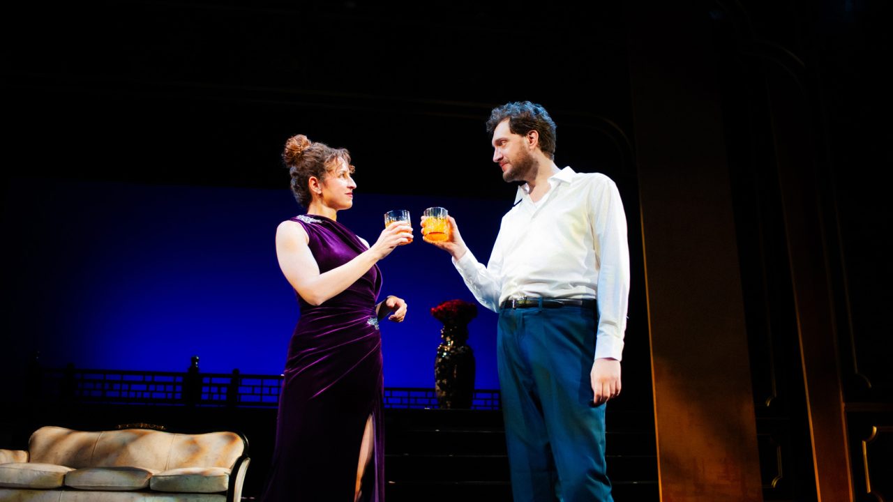 Renee (Amanda Pulcini) and Rene Gallimard (Dean Linnard) meet at a party in San Francisco Playhouse's "M. Butterfly," performing February 5 - March 14, 2026. Renee (Amanda Pulcini) and Rene Gallimard (Dean Linnard) meet at a party in San Francisco Playhouse's "M. Butterfly," performing February 5 - March 14, 2026.