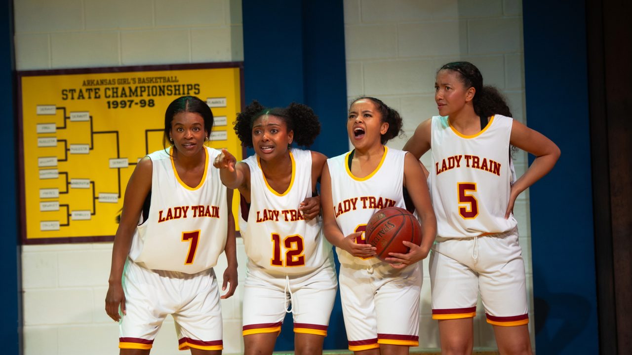 Lady Train teammates (l to r: Paige Mayes, Courtney Gabrielle Williams, Camille Collaço, and Emma Gardner) prepare for their tournament game in San Francisco Playhouse's "Flex," performing March 26 - May 2, 2026. Lady Train teammates (l to r: Paige Mayes, Courtney Gabrielle Williams, Camille Collaço, and Emma Gardner) prepare for their tournament game in San Francisco Playhouse's "Flex," performing March 26 - May 2, 2026.