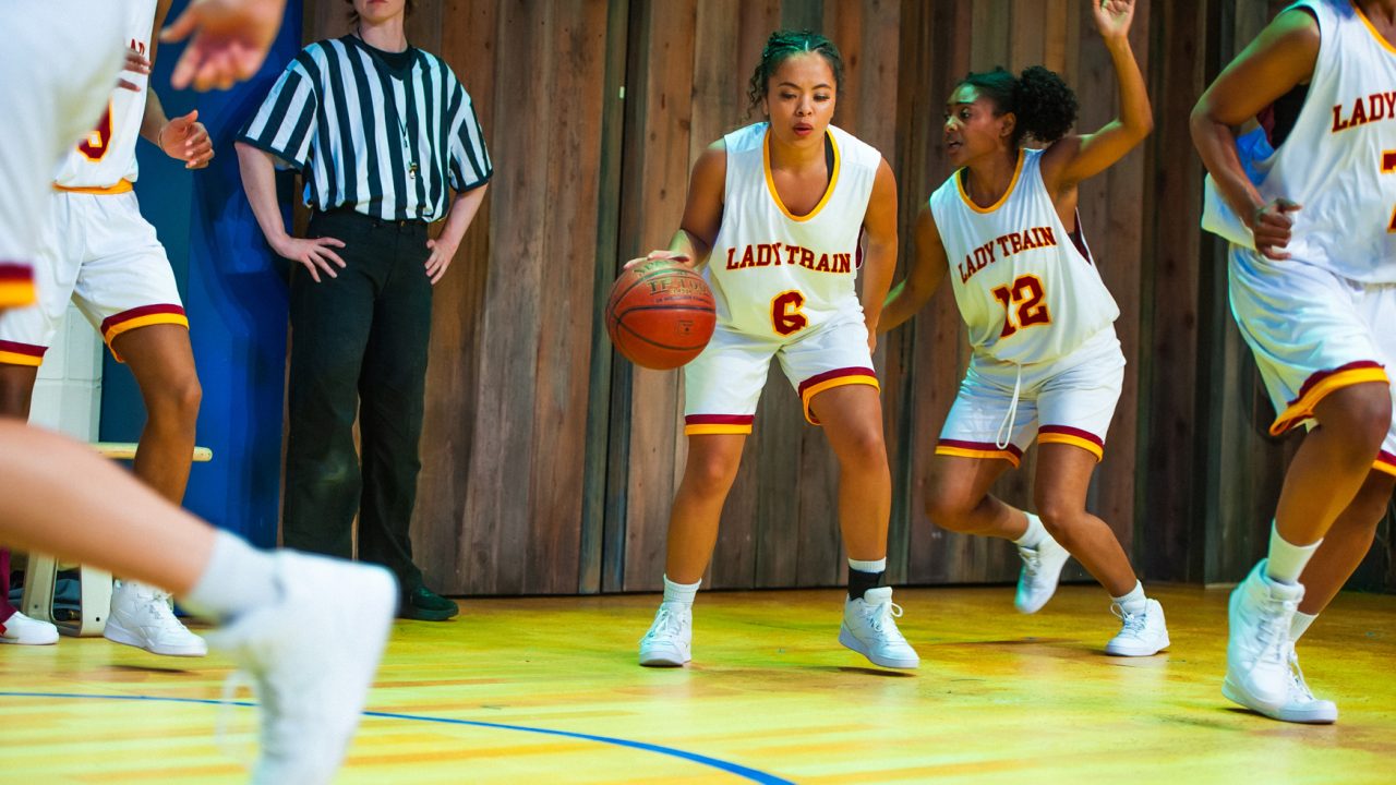 April (Camille Collaço) and Donna (Courtney Gabrielle Williams) play basketball in San Francisco Playhouse's "Flex," performing March 26 - May 2, 2026.