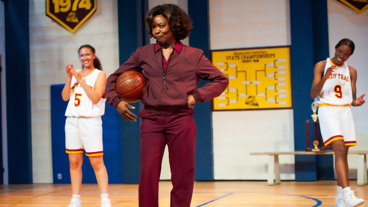 Coach Francine Pace (Halili Knox - center) addresses her team (left - Emma Gardner, right - Santeon Brown) in San Francisco Playhouse's "Flex," performing March 26 - May 2, 2026. Coach Francine Pace (Halili Knox - center) addresses her team (left - Emma Gardner, right - Santeon Brown) in San Francisco Playhouse's "Flex," performing March 26 - May 2, 2026.