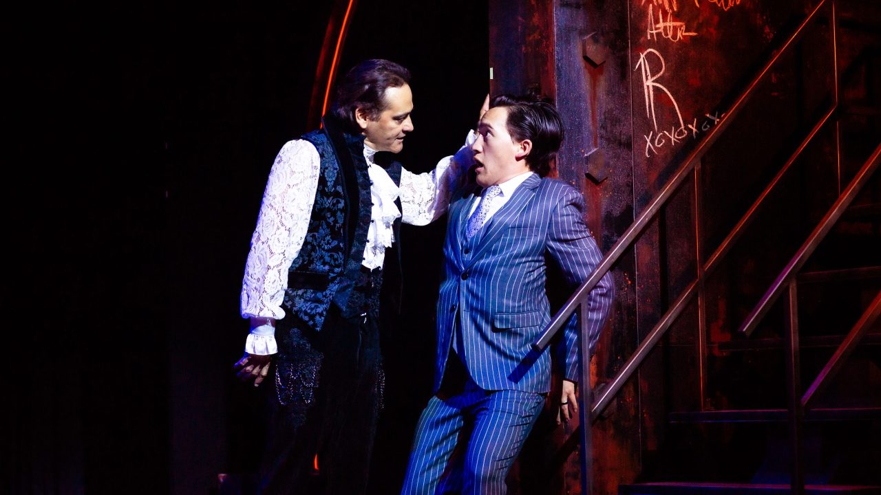 Dracula (Johnny Moreno) menaces Jonathan (James Aaron Oh) in San Francisco Playhouse's "Dracula: A Feminist Revenge Fantasy, Really," performing May 14 - June 27.