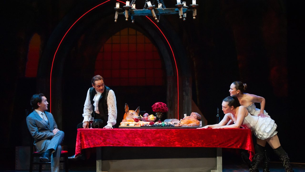 (l to r) Jonathan (James Aaron Oh) is surprised by Dracula's (Johnny Moreno) minions Drusilla (Elizabeth Cowperthwaite) and Marilla (Charisse Loriaux) in San Francisco Playhouse's "Dracula: A Feminist Revenge Fantasy, Really," performing May 14 - June 27.