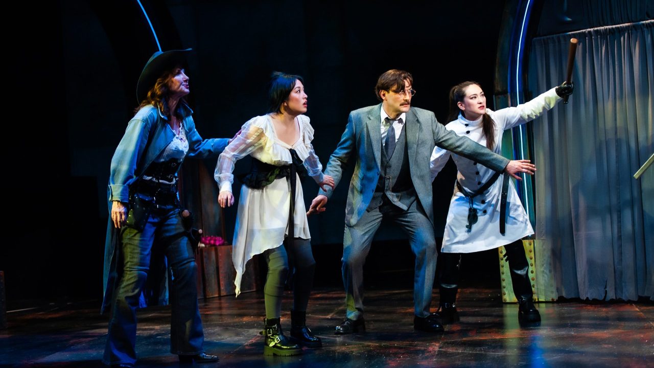 (l to r) Van Helsing (Susi Damilano), Mina (Sharon Shao), Seward (Josh Schell), and Miller (Elizabeth Cowperthwaite) are startled in San Francisco Playhouse's "Dracula: A Feminist Revenge Fantasy, Really," performing May 14 - June 27.