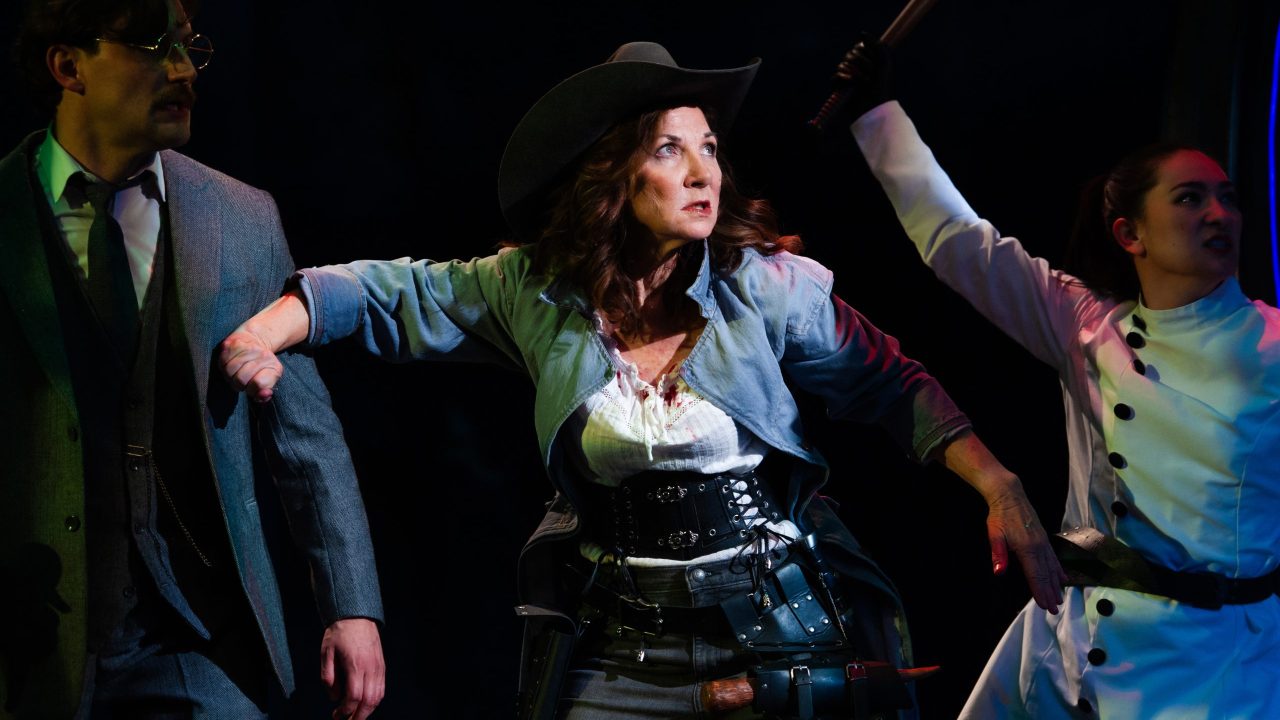 Seward (Josh Schell), Van Helsing (Susi Damilano), and Miller (Elizabeth Cowperthwaite) ready for the fight in San Francisco Playhouse's "Dracula: A Feminist Revenge Fantasy, Really," performing May 14 - June 27.